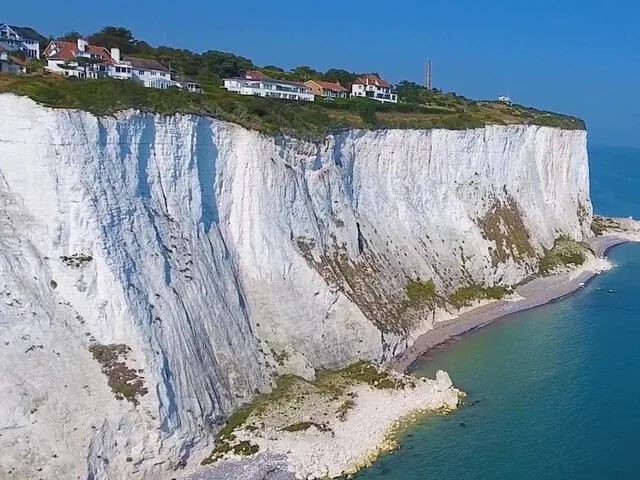 Aerial view of the White Cliffs of Dover next to the ocean