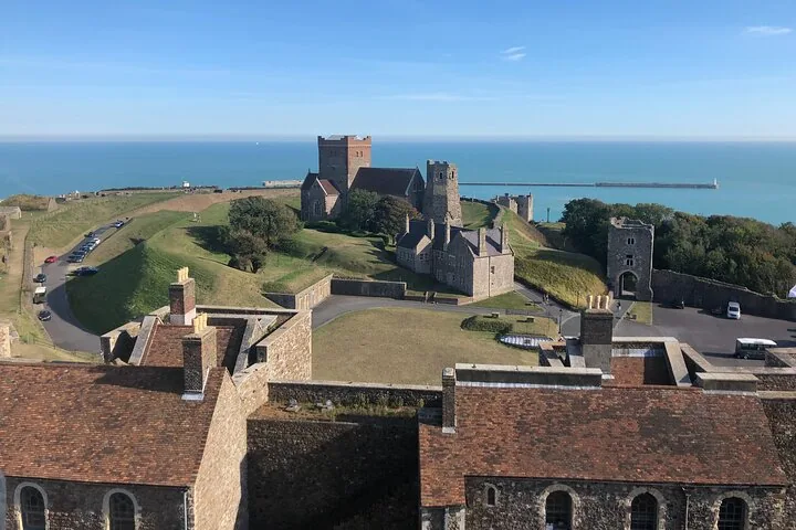 Scenic view overlooking a historic castle complex near the coastline